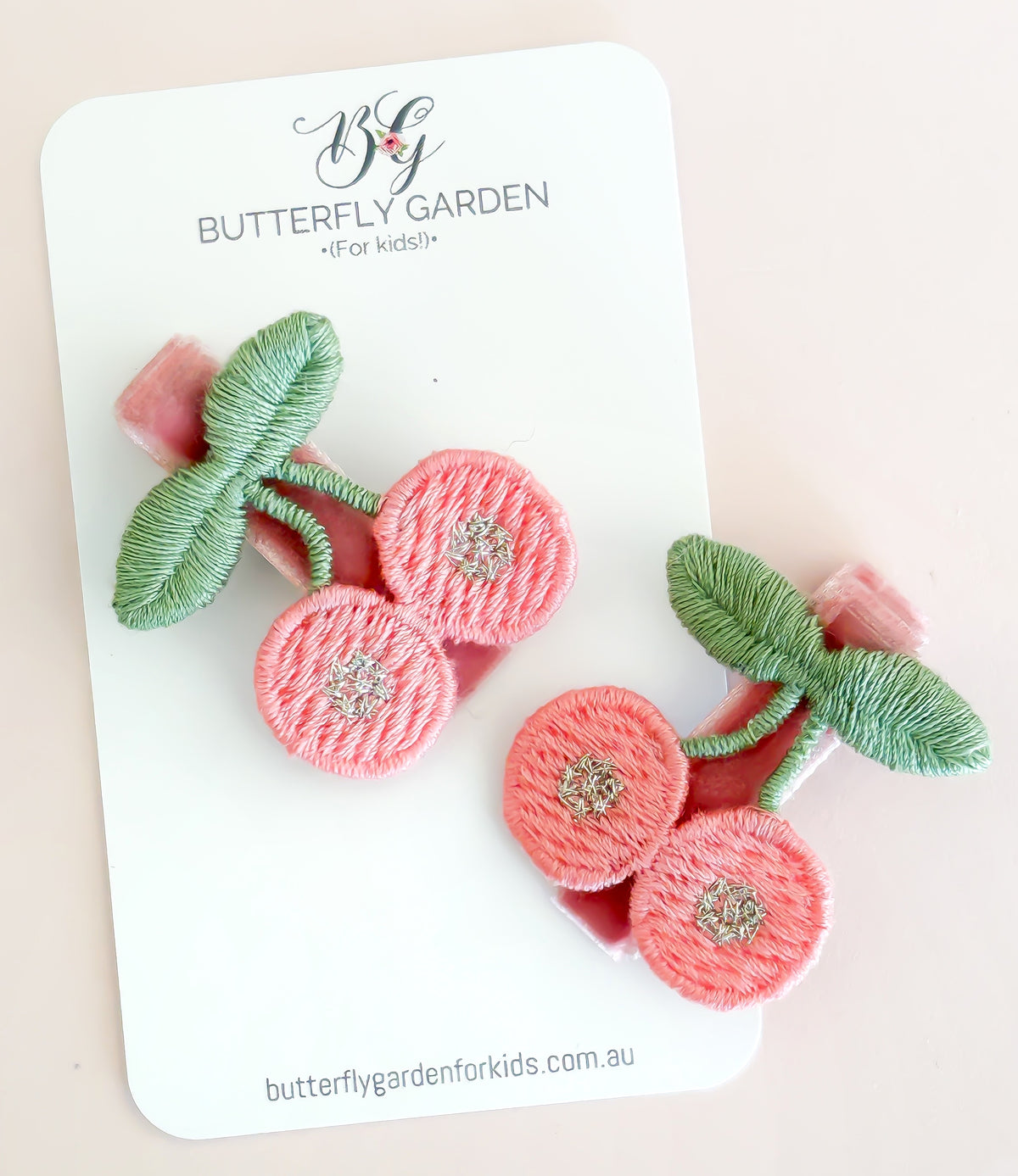 Felicity Cherry Fringe Clip duo