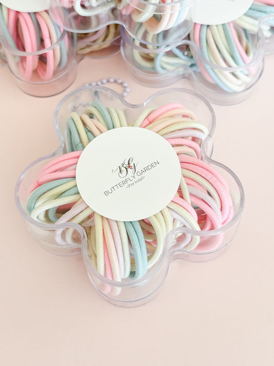 Daisy hair tie gift pack - 60 pastel bands