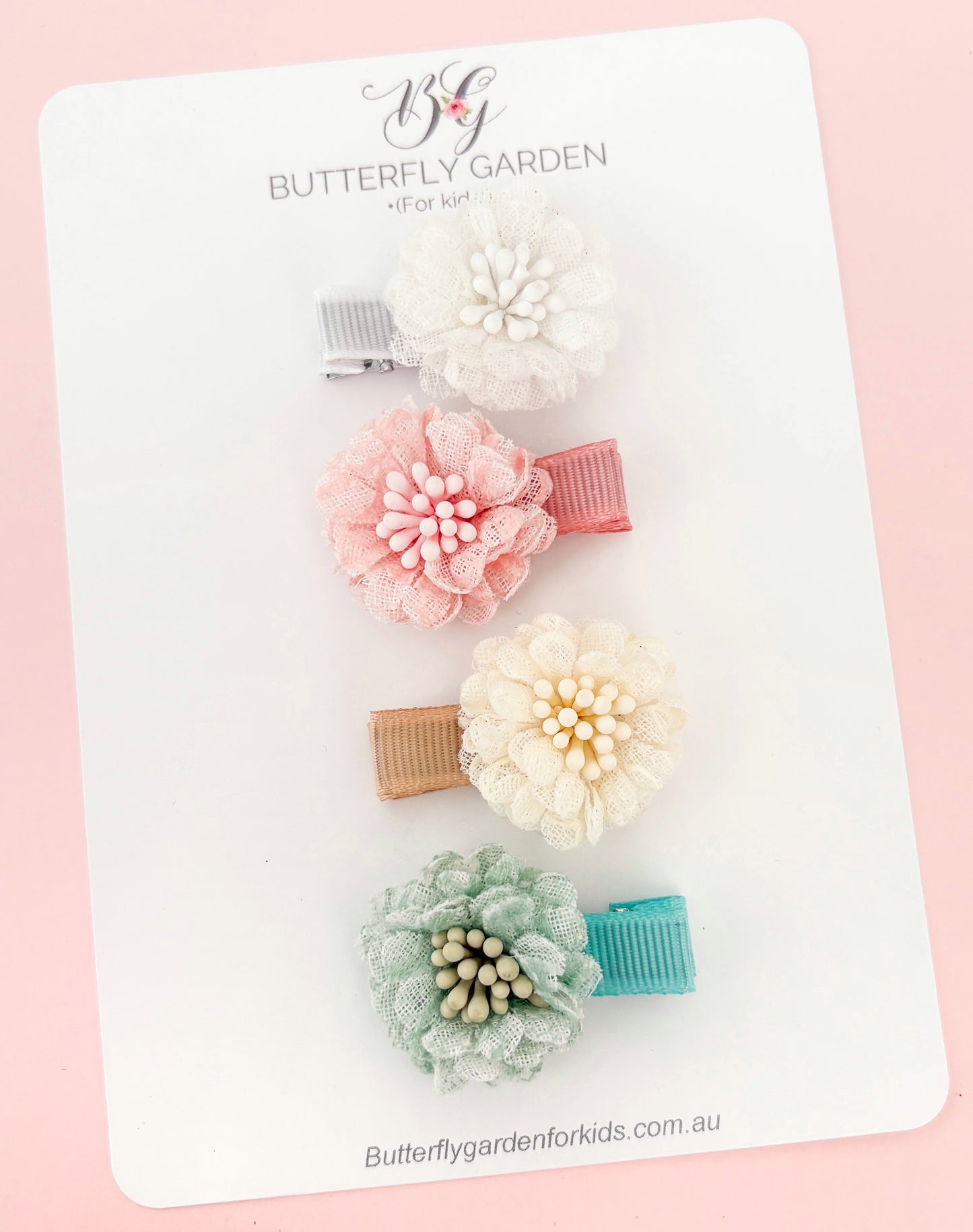 Marshmallow Blooms Fringe Clips, set of 4.