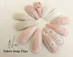 Pink PomPom fabric snap clip duo