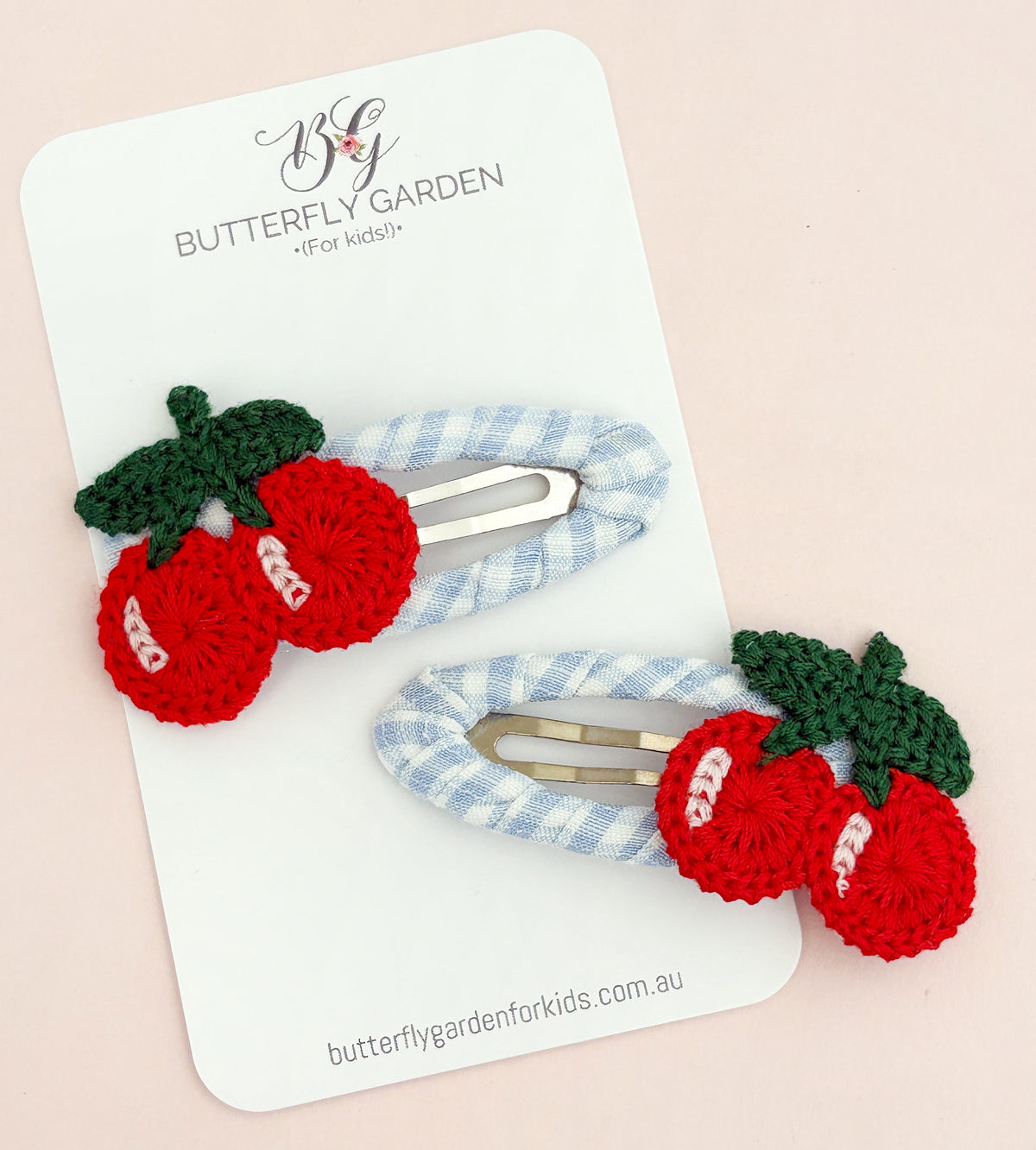 Cleo Cherry Fringe Clip duo